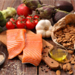 BSFC Stock. Healthy food including salmon, almonds, garlic, broccoli, avocado, and lettuce