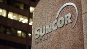 A sign for a Suncor Energy (SU) building.
