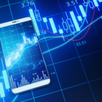 Close up of phone with creative forex chart on blue background. Trade, finance, technology and communication concept. 3D Rendering. Tech Stocks to Buy Before the Bull Market Returns. Tech Stocks to buy